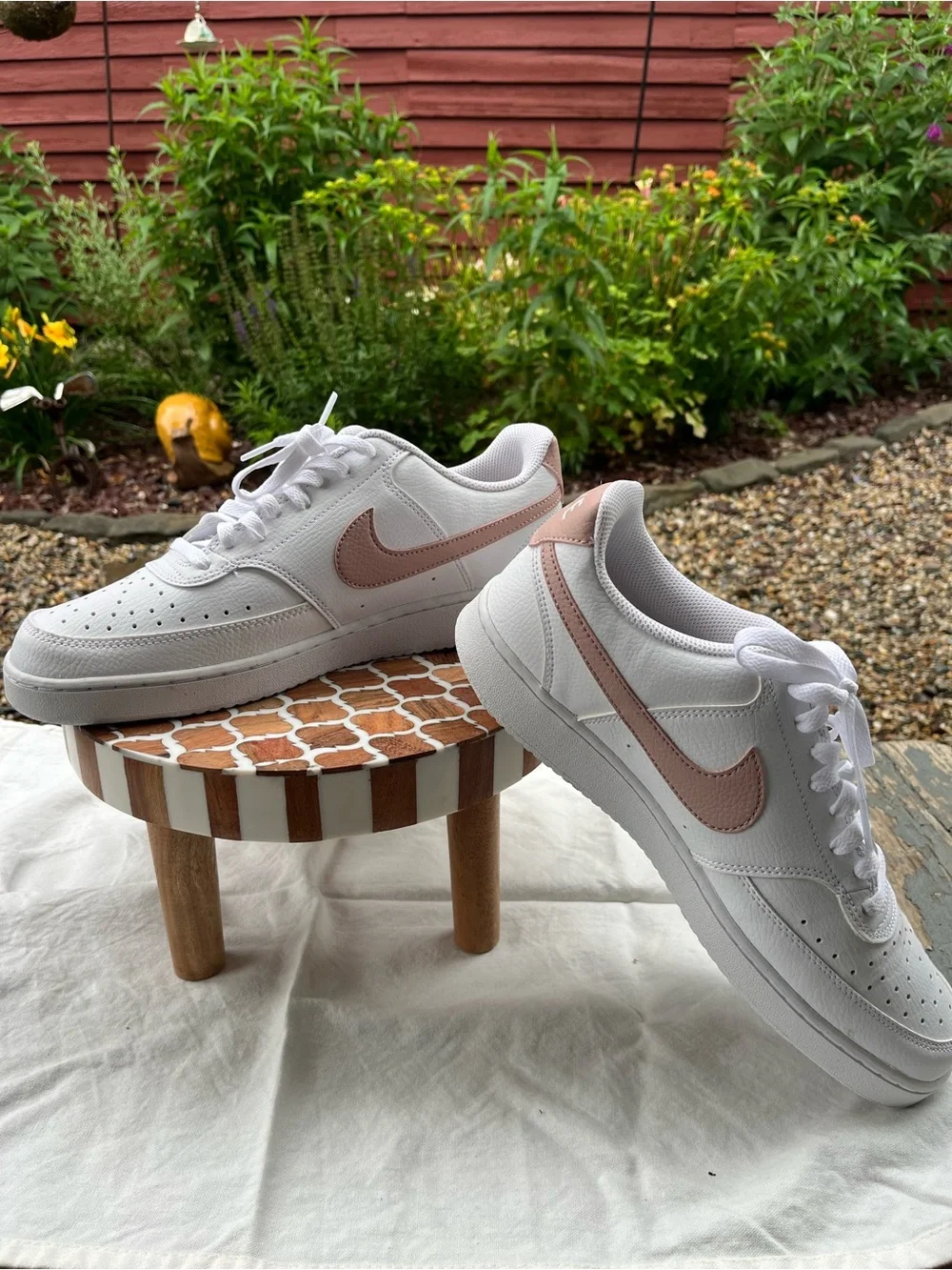 Nike White Low-Top sneakers with pink accents